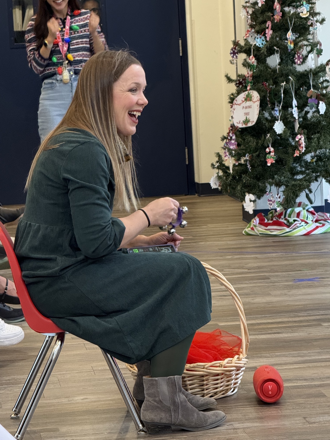 Sarah Sampson leading children in music and movement